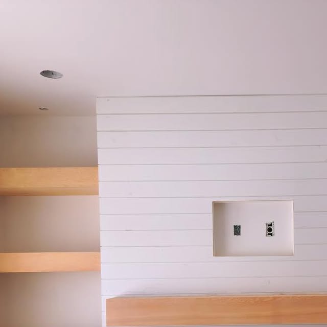 Custom millwork feature wall installed by Nand Finishing